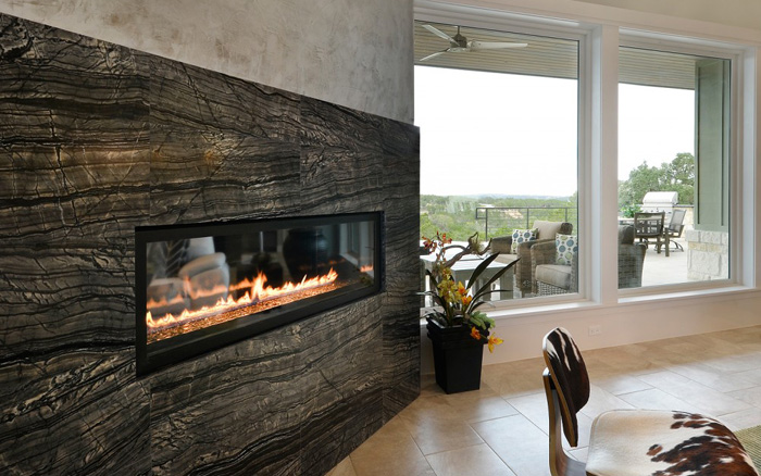 A striking combination of a deep black background with waves of white and dark grey veining.