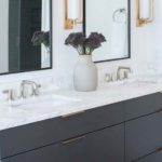 Predominantly white marble with subtle gold veining to add depth and movement.
