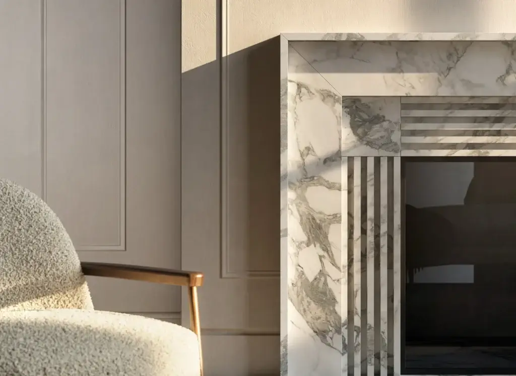Elegant living room with a stone fireplace surround, a cozy white boucle armchair, and natural light.