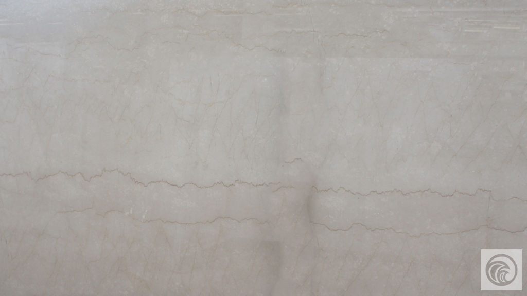 Botticino Crema Extra marble slab with a light beige background and fine brown veining
